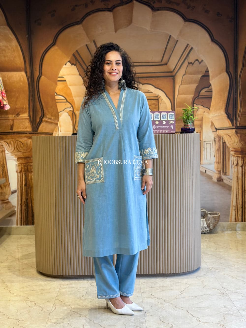 Grace in Blue: Timeless Elegance with Delicate Embroiderd