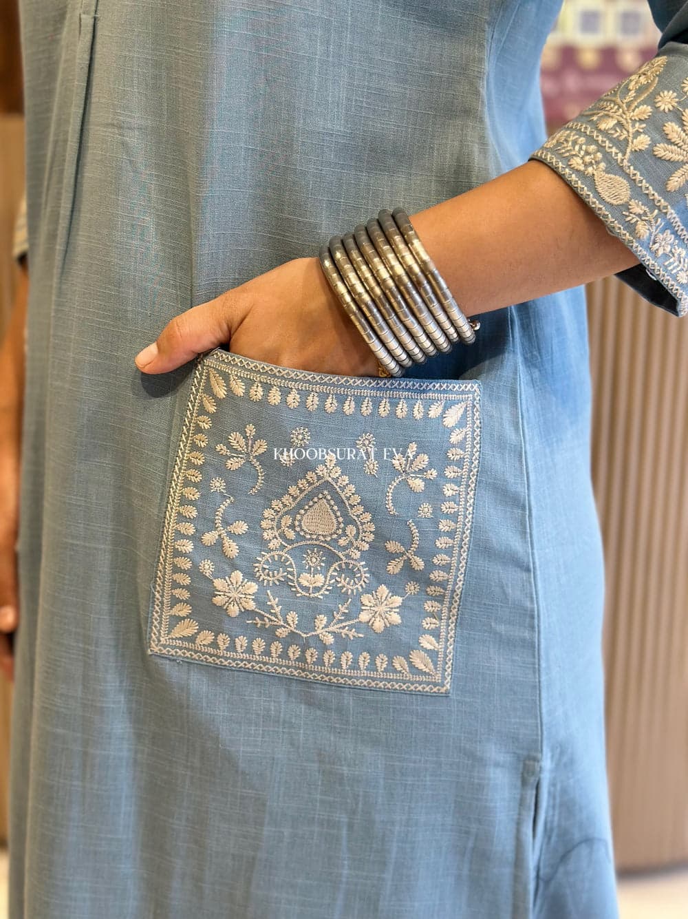 Grace in Blue: Timeless Elegance with Delicate Embroiderd