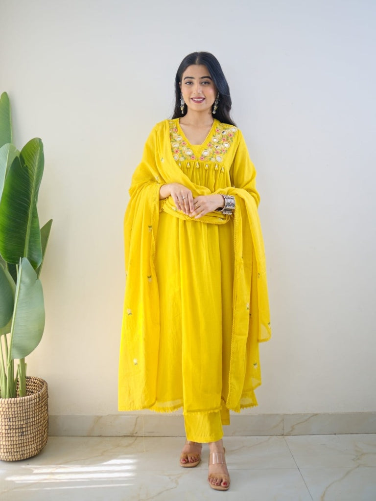 Yellow Mirror Work Festive Kurta Set with Tassels for Women